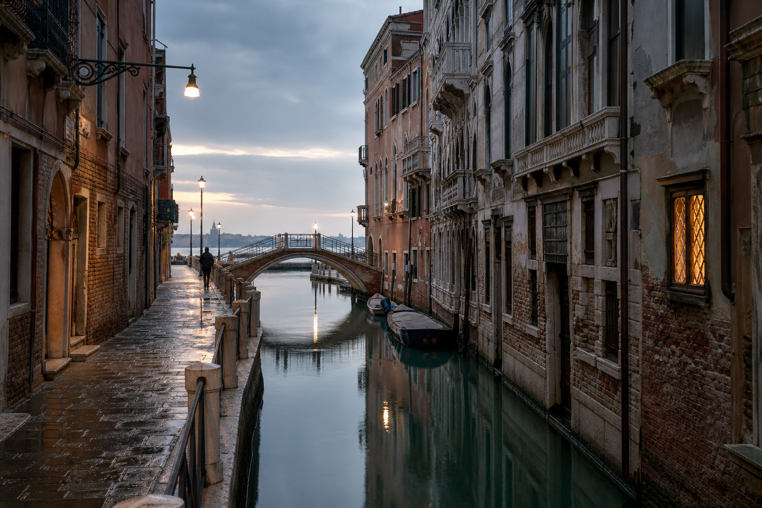 Quiet Venice canal and historic palazzi at early morning