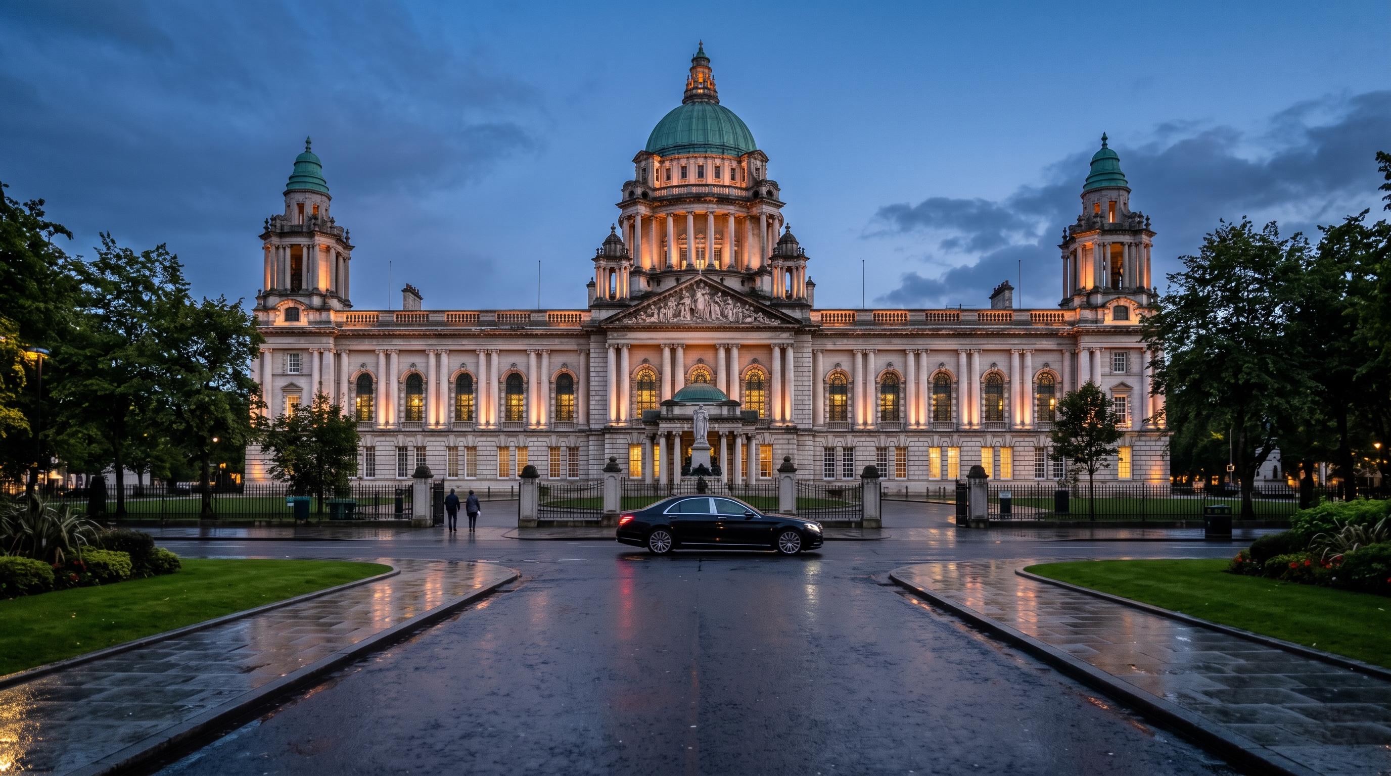 Belfast City Hall and city centre after rain at dusk